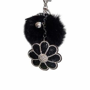 Black Flower Keychain with Fur Pom Pom